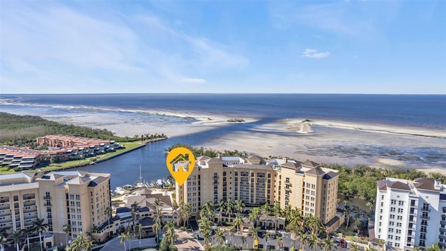 bird's eye view featuring a view of the beach and a water view