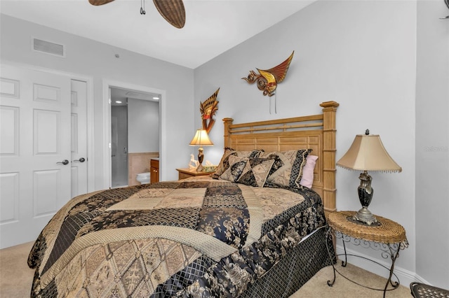 carpeted bedroom featuring connected bathroom and ceiling fan