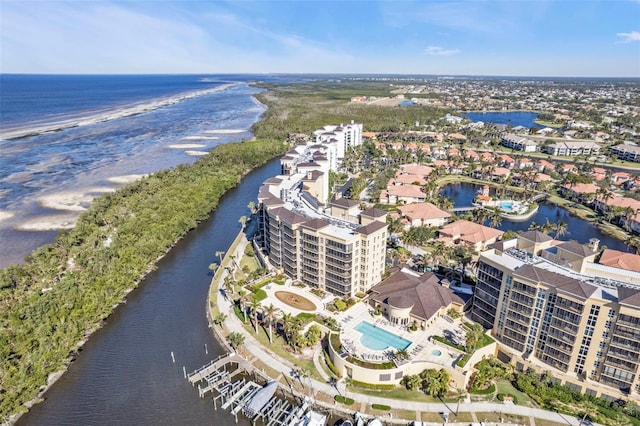 drone / aerial view with a water view