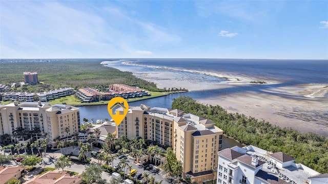 aerial view with a view of the beach and a water view