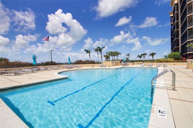 view of pool featuring a patio