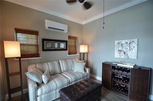 living room featuring a wall mounted air conditioner, hardwood / wood-style floors, ceiling fan, and crown molding