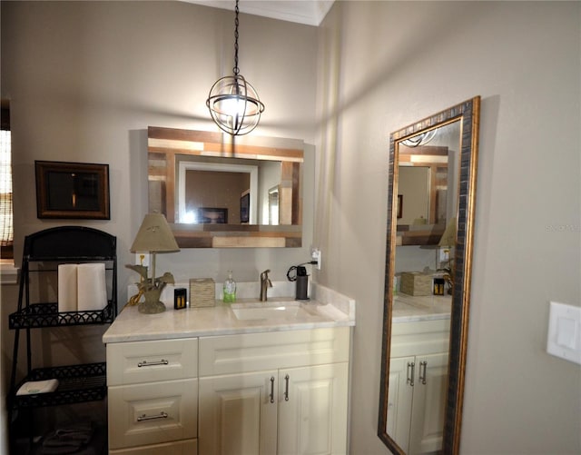 bathroom featuring vanity and crown molding