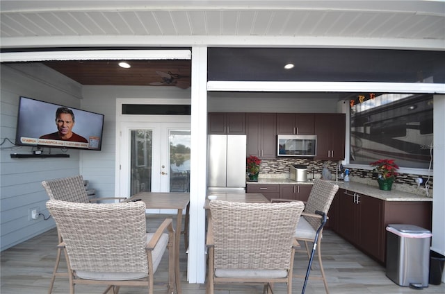 view of patio / terrace featuring french doors