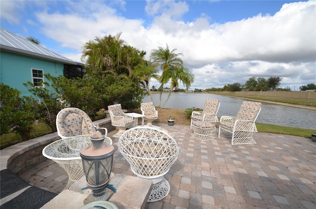 view of patio / terrace featuring a water view