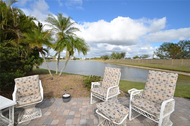 view of patio featuring a water view