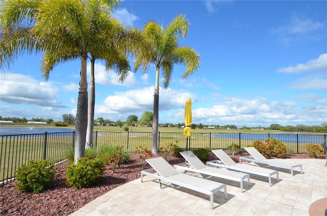 view of patio / terrace with a water view