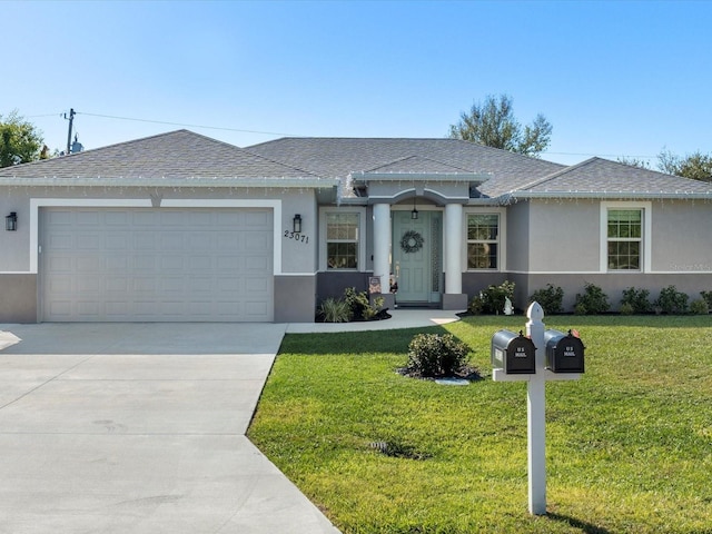 ranch-style home with a front yard and a garage