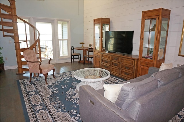 living room with dark hardwood / wood-style floors