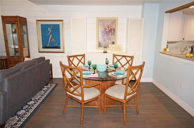 dining room featuring dark wood-type flooring