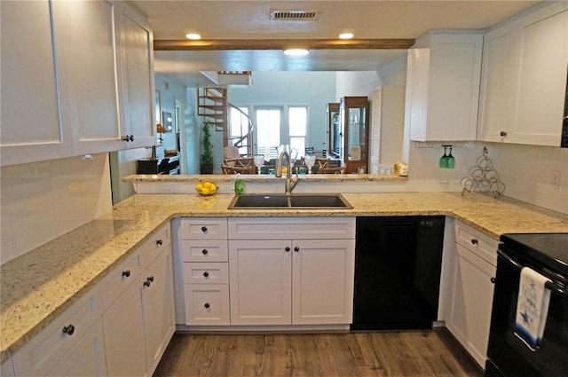 kitchen featuring white cabinetry, sink, black appliances, and wood-type flooring