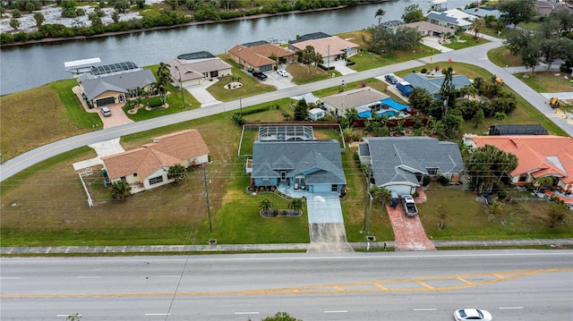 drone / aerial view with a water view