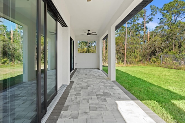 view of patio with ceiling fan