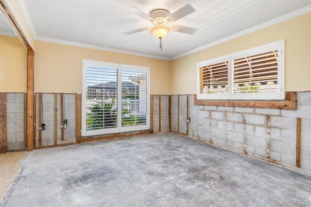 empty room with ceiling fan and ornamental molding