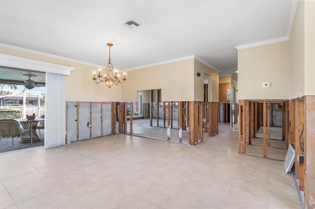 spare room with ceiling fan with notable chandelier and ornamental molding