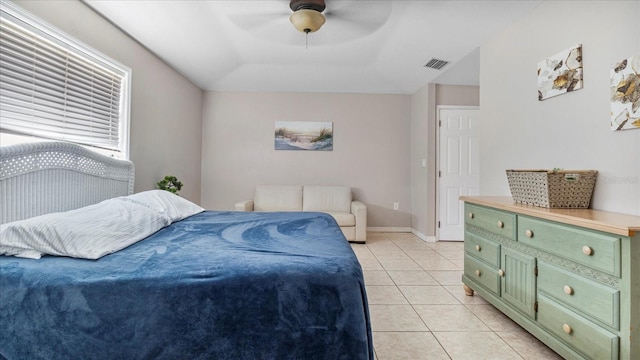 bedroom featuring light tile patterned floors and ceiling fan