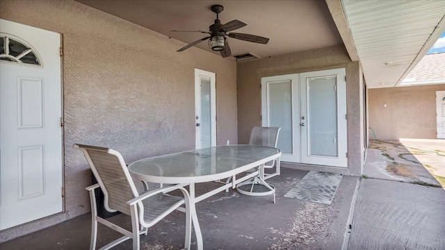 view of patio featuring ceiling fan