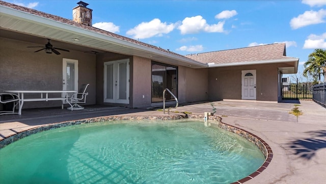 view of pool featuring a patio area and ceiling fan