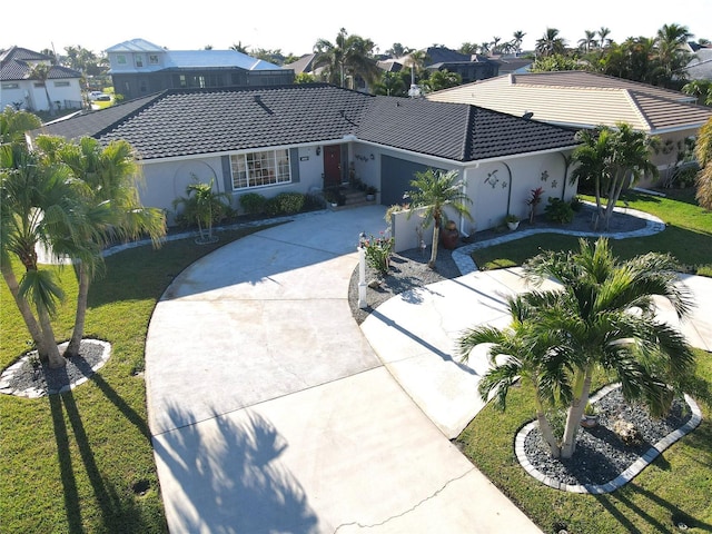 ranch-style house featuring a front yard