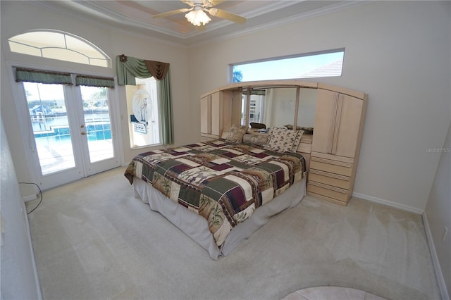 bedroom with french doors, ceiling fan, access to exterior, ornamental molding, and light colored carpet