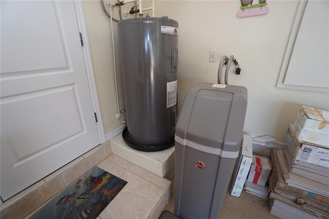 utility room featuring water heater