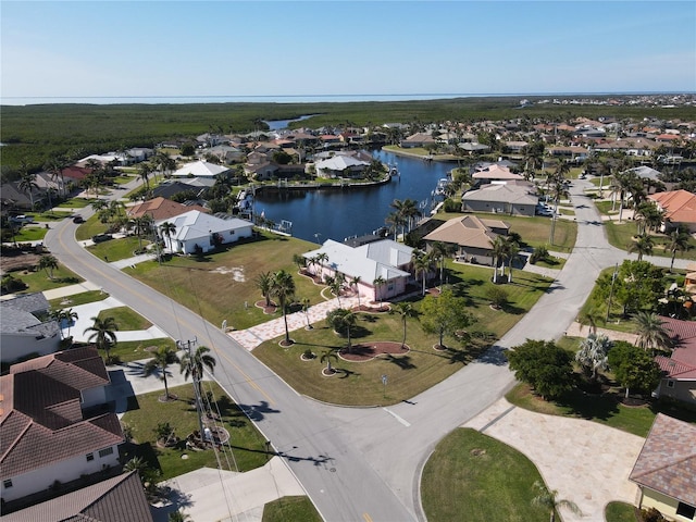 drone / aerial view with a water view