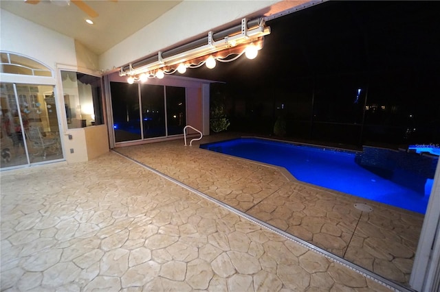 view of pool featuring ceiling fan