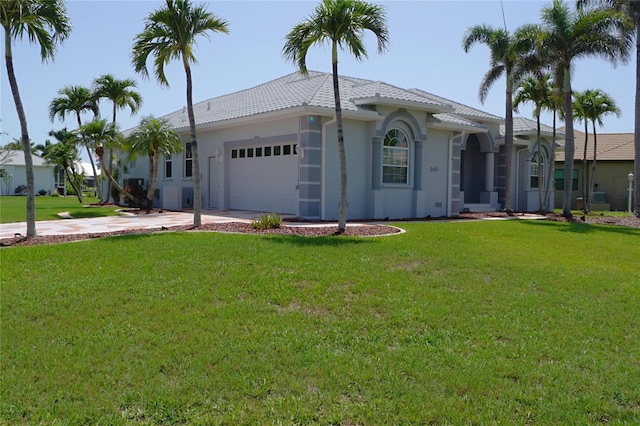 649 Maltese Dr, Punta Gorda, FL 33950 - ranch-style home featuring an attached garage, driveway, and a front yard
