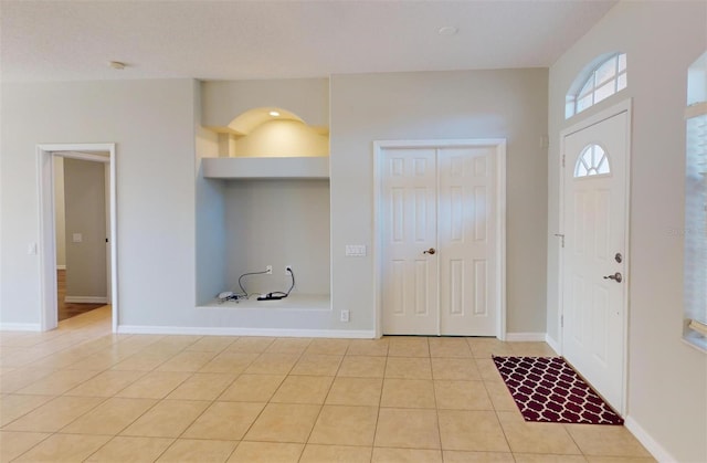 view of tiled foyer entrance