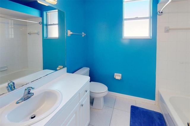 full bathroom featuring tile patterned flooring, vanity, toilet, and tiled shower / bath