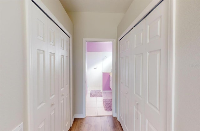 hallway featuring light hardwood / wood-style flooring