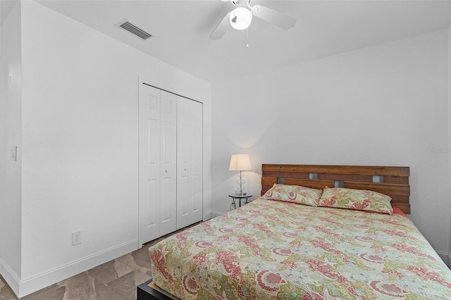 bedroom featuring a closet and ceiling fan