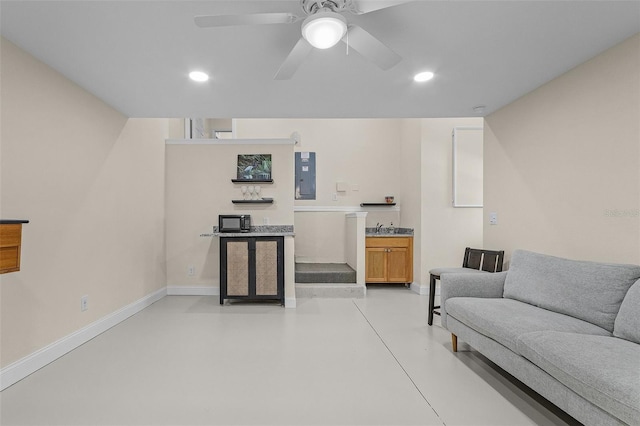 living room with electric panel and ceiling fan