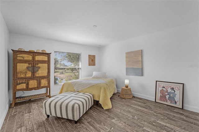 bedroom featuring dark hardwood / wood-style floors