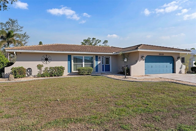 view of front facade featuring a garage and a front lawn