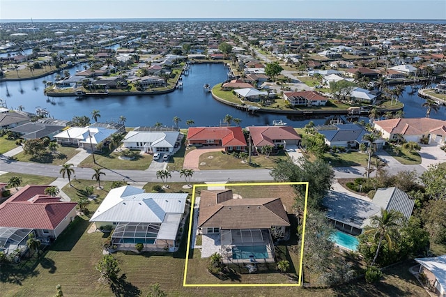 aerial view featuring a water view