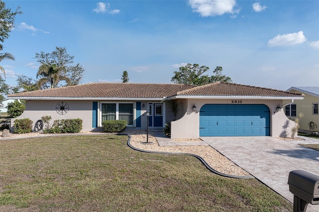 single story home featuring a front yard and a garage