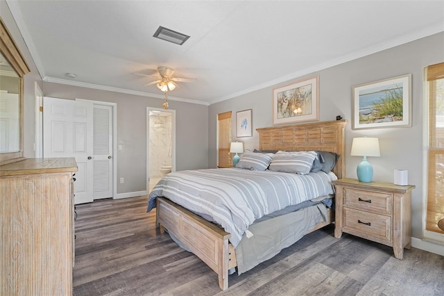 bedroom featuring ensuite bathroom, ceiling fan, crown molding, and dark hardwood / wood-style floors