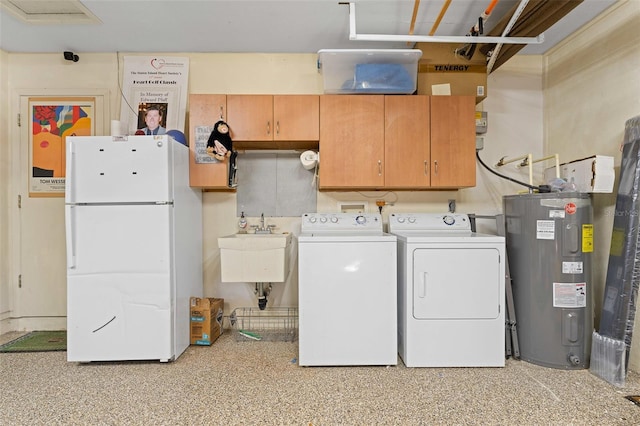 laundry room featuring cabinets, electric water heater, separate washer and dryer, and sink