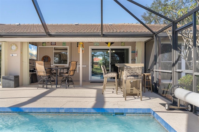 exterior space with a patio and a lanai