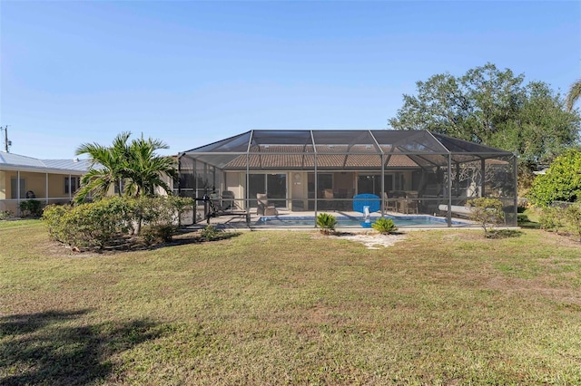 view of yard featuring glass enclosure