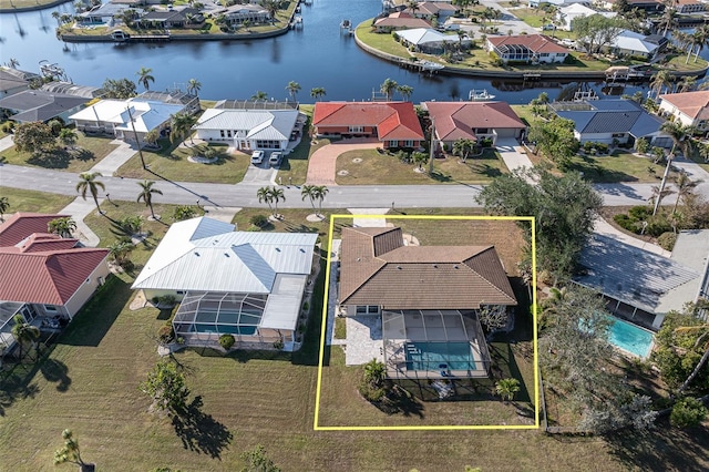 drone / aerial view with a water view