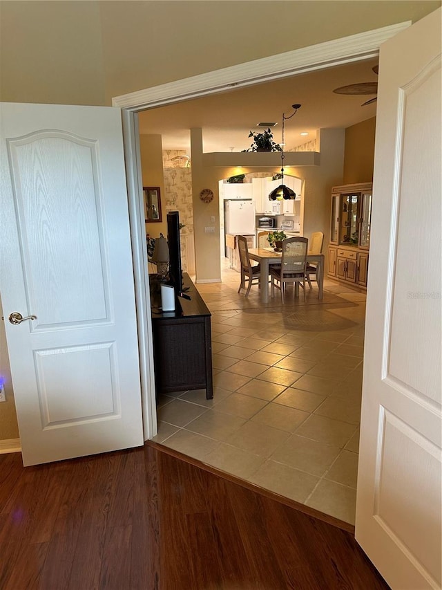 corridor with wood finished floors