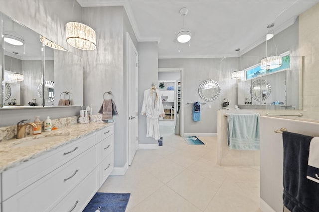 bathroom featuring crown molding, tile patterned flooring, vanity, and a chandelier