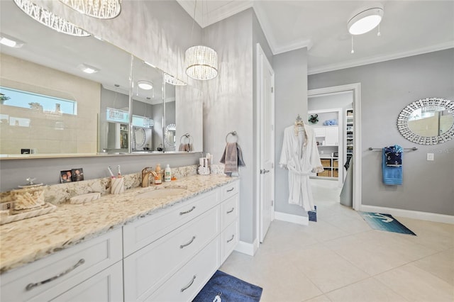 bathroom with vanity, crown molding, a shower, a chandelier, and tile patterned flooring