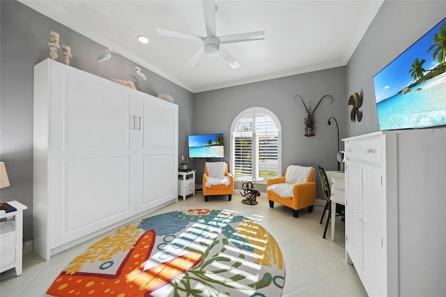 rec room featuring ceiling fan, ornamental molding, and light tile patterned floors