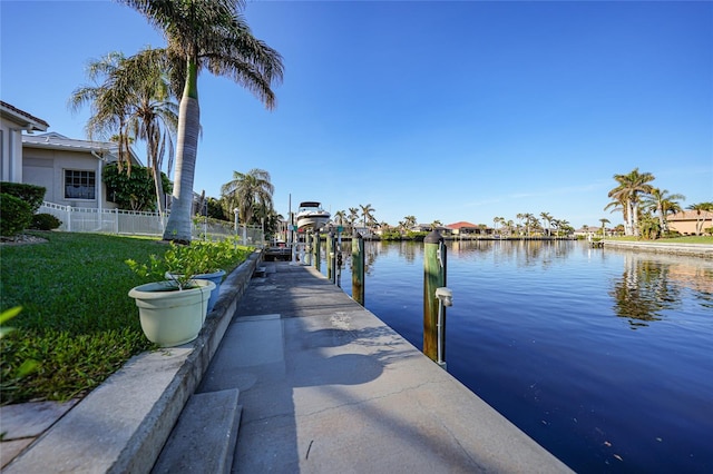 dock area with a water view