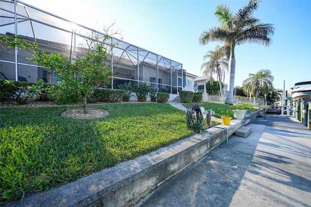 view of community featuring a lawn