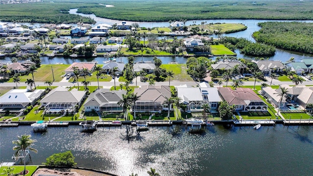 aerial view with a water view and a residential view