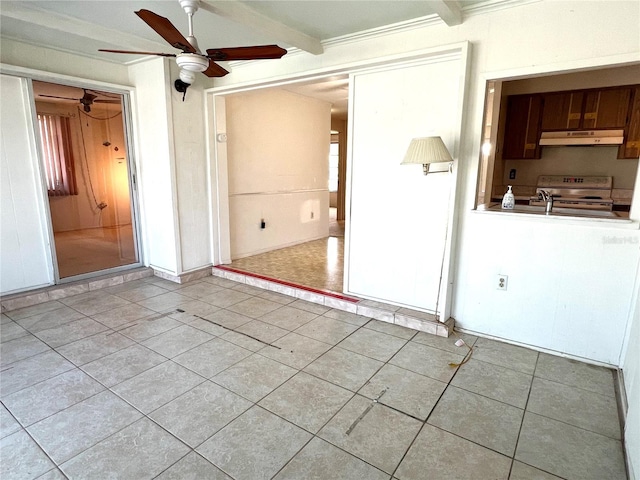 tiled spare room with ceiling fan, ornamental molding, and beamed ceiling